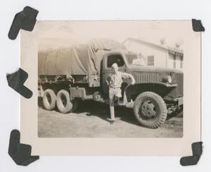 [Soldier with Truck at Camp Barkeley]