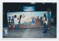 Primary view of [Three Students and Mural]