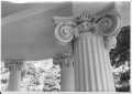 Photograph: [Ornate woodwork of the top of the columns, Moore House]