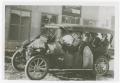 Photograph: [Photograph of People in a Car]
