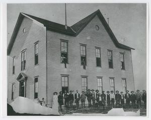Primary view of object titled '[People in Front of a Building]'.