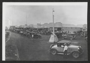 Primary view of object titled '[Street Scene in Hobbs, New Mexico]'.