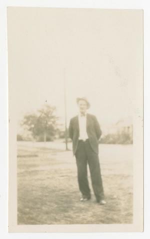 [W. O. Reeves Standing in Field]