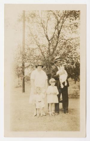 [Photograph of John, Mary Ruth, Bill, Johnny, and Elana Reeves]