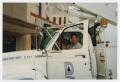 Photograph: [Two Men in City of Denton Truck]
