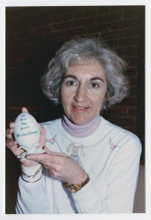 Primary view of object titled '[Gretchen Cummings with Good Egg Award]'.