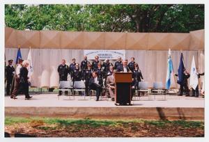 [Police Chief Mike Jez, Mayor Euline Brock, and Officers on Stage at Law Enforcement Memorial Commission]