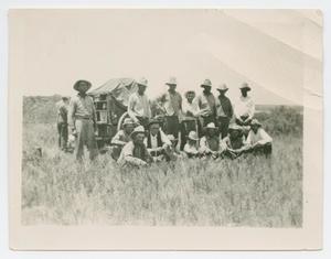 Primary view of object titled '[Cowhands Posing by Chuckwagon]'.