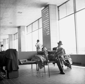 Buddy Rich and Ray Brown, waiting in a departure lounge