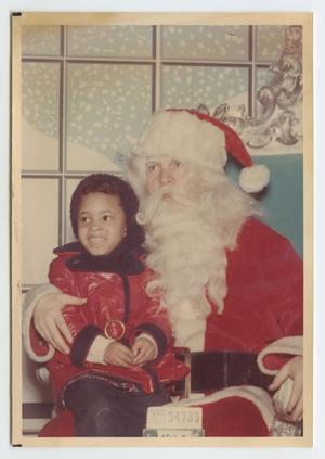 Young girl with Santa Claus