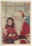 Photograph: Young girl with Santa Claus