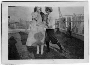 Two Unidentified Girls; One Dressed as a Boy