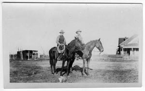Two Men Sitting Horseback