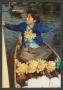 Primary view of [Woman in Boat with Bananas]