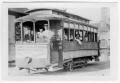 Thumbnail image of item number 1 in: '[Walter Wiggs, Sr., Jim Grady, two unidentified men, and one unidentified boy on streetcar]'.