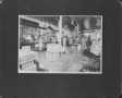 Photograph: [Inside of C.D. Myers Store. Employees standing behind the counter.]