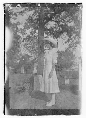 Unidentified Girl Standing in a Cemetery