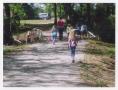 Thumbnail image of item number 1 in: '[Girls Walking Down a Road]'.