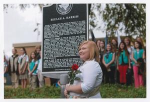 Primary view of object titled '[Elise Clements With the Buelah A. Harriss Historical Marker]'.