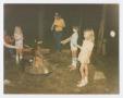 Photograph: [Children Cooking Hot Dogs Over a Campfire]