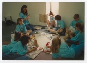 Primary view of object titled '[Girl Scouts Eating on the Floor]'.