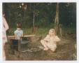 Thumbnail image of item number 1 in: '[Children Sitting Next to a Campfire]'.