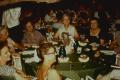 Photograph: [Photograph of a group of people dining]