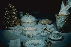 [Gold formal table setting]
