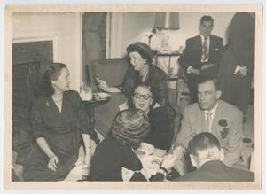 [Photograph of Helen Corbitt dining]