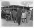 Primary view of [Loading a casket into a hearse for the mass funeral service for victims of the 1947 Texas City Disaster]