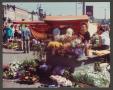 Photograph: [Woman at Flower Stand]
