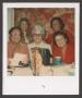 Photograph: [Charlyne Creger and Four People at Table]