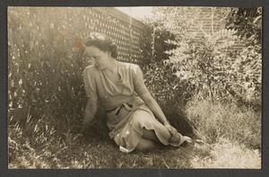 Primary view of object titled '[Lucille Moore Gilstrap in Grass]'.