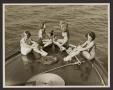 Photograph: [Women Seated at Bow of Boat]