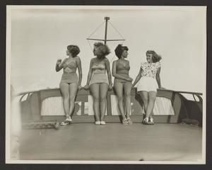 [Creger and Others Posed in Swimsuits on Boat]