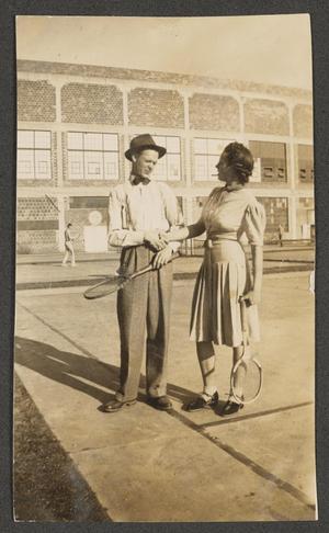 [Man and Woman With Tennis Rackets]