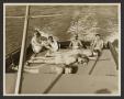Photograph: [Men and Women Sun Bathing on Boat #2]