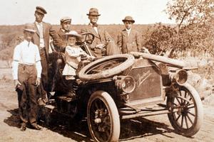 [W. H. Gray and Family in Old Car]