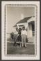 Photograph: [Woman and Two Men by House]