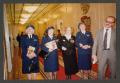 Photograph: [Charlyne Creger and Four People in a Hallway]