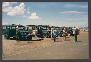 Primary view of object titled '[People with Jeeps]'.