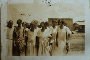 Primary view of object titled '[Women in Front of Abilene Paper Works]'.