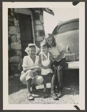 [Woman and Children by Car]