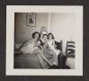 Photograph: [Four Young Women Gathered on Bed #2]