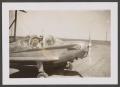 Photograph: [Man and Woman in Plane]