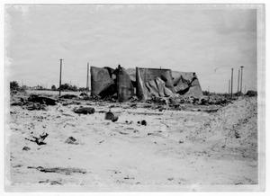 [A ruined storage tank after the 1947 Texas City Disaster]