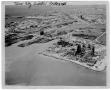Thumbnail image of item number 1 in: '[Aerial view of the Monsanto plant, refinery structures and port after the 1947 Texas City Disaster]'.