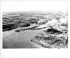 Primary view of object titled '[Aerial view of the Monsanto plant and port facilities after the 1947 Texas City Disaster]'.