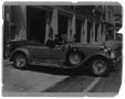 Photograph: [Chief Coffman in Car with an Unknown Officer]