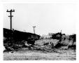 Thumbnail image of item number 1 in: '[Metal debris near the railroad tracks after the 1947 Texas City Disaster]'.